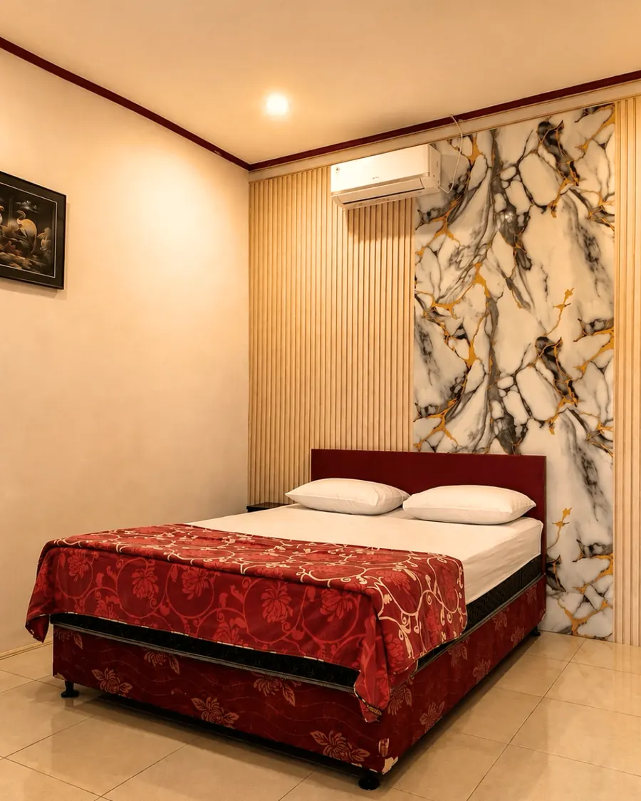 Kamar VIP dengan satu tempat tidur besar dan pendingin ruangan